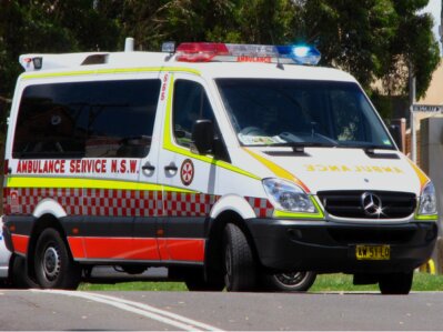 Paramedics providing emergency medical care