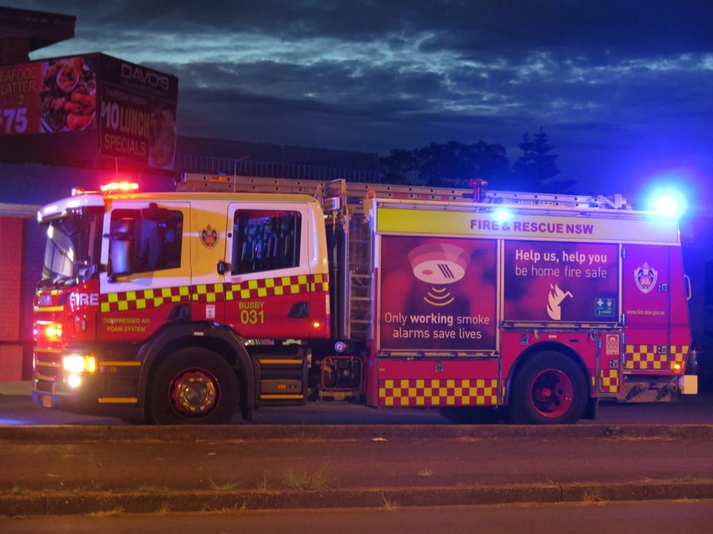 Firefighters in protective gear at an incident
